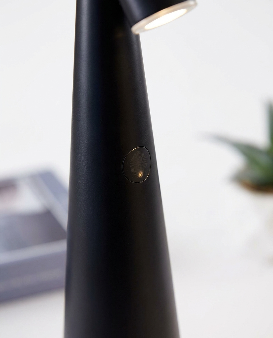 Close-up of minimalist finish and dimmable touch control of a wireless LED lamp