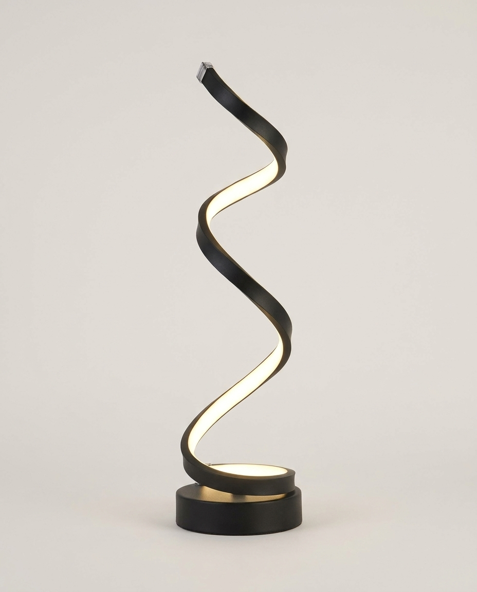 Spiral LED desk lamp on a clean light neutral studio background
