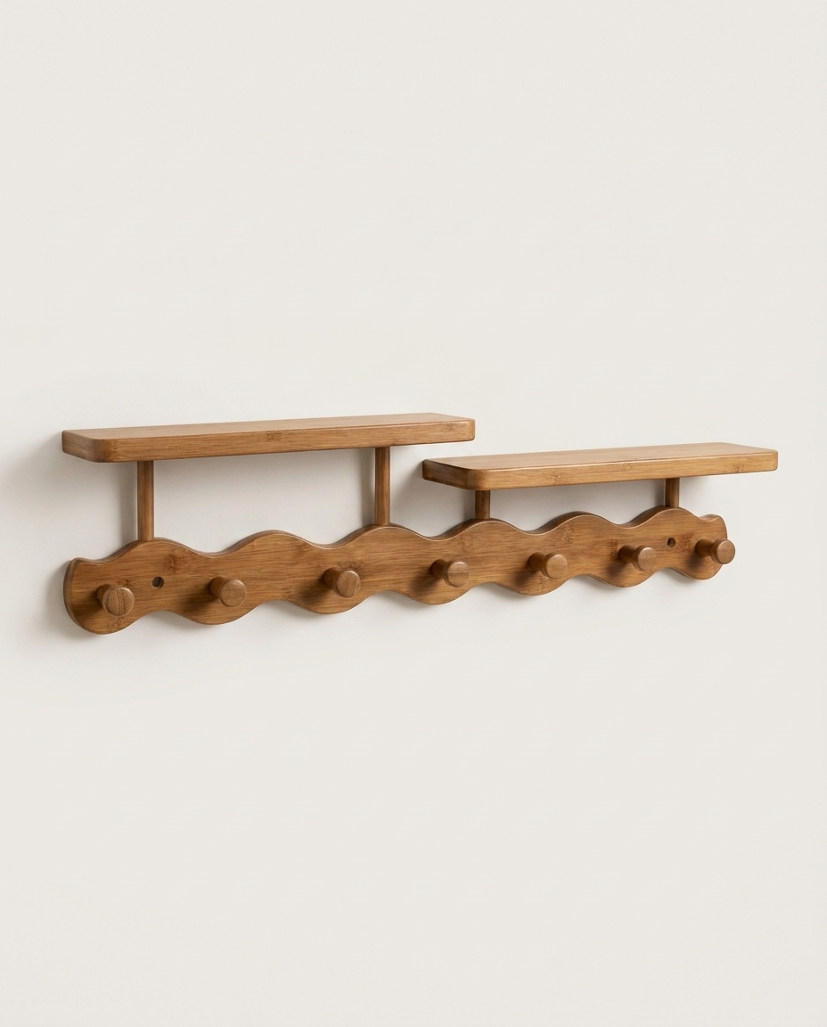Bamboo wall mounted coat rack with shelf isolated on a clean neutral studio background