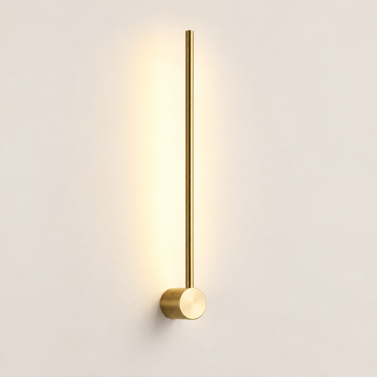 Linear LED wall light in gold