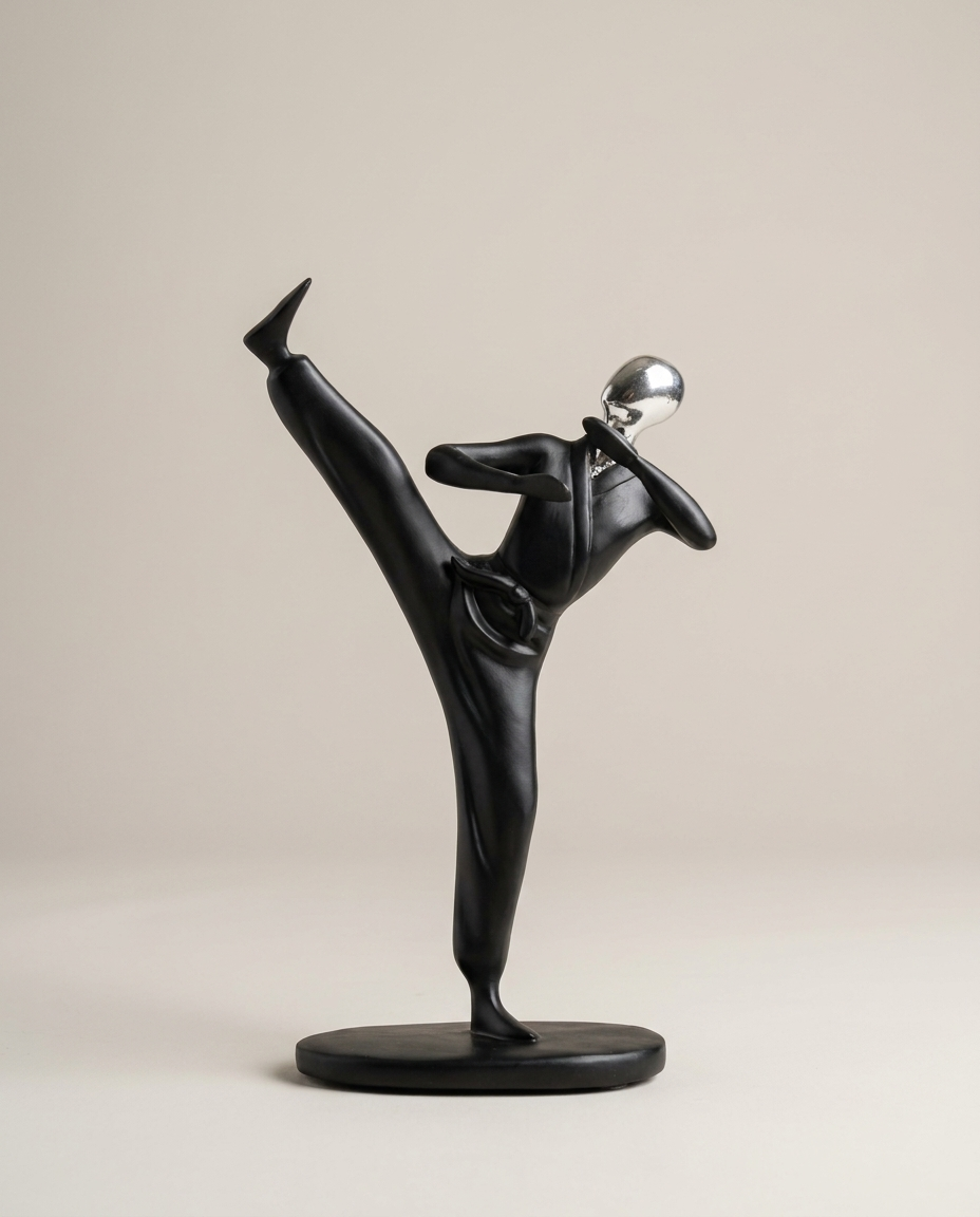 Sports resin figurine set on a plain background