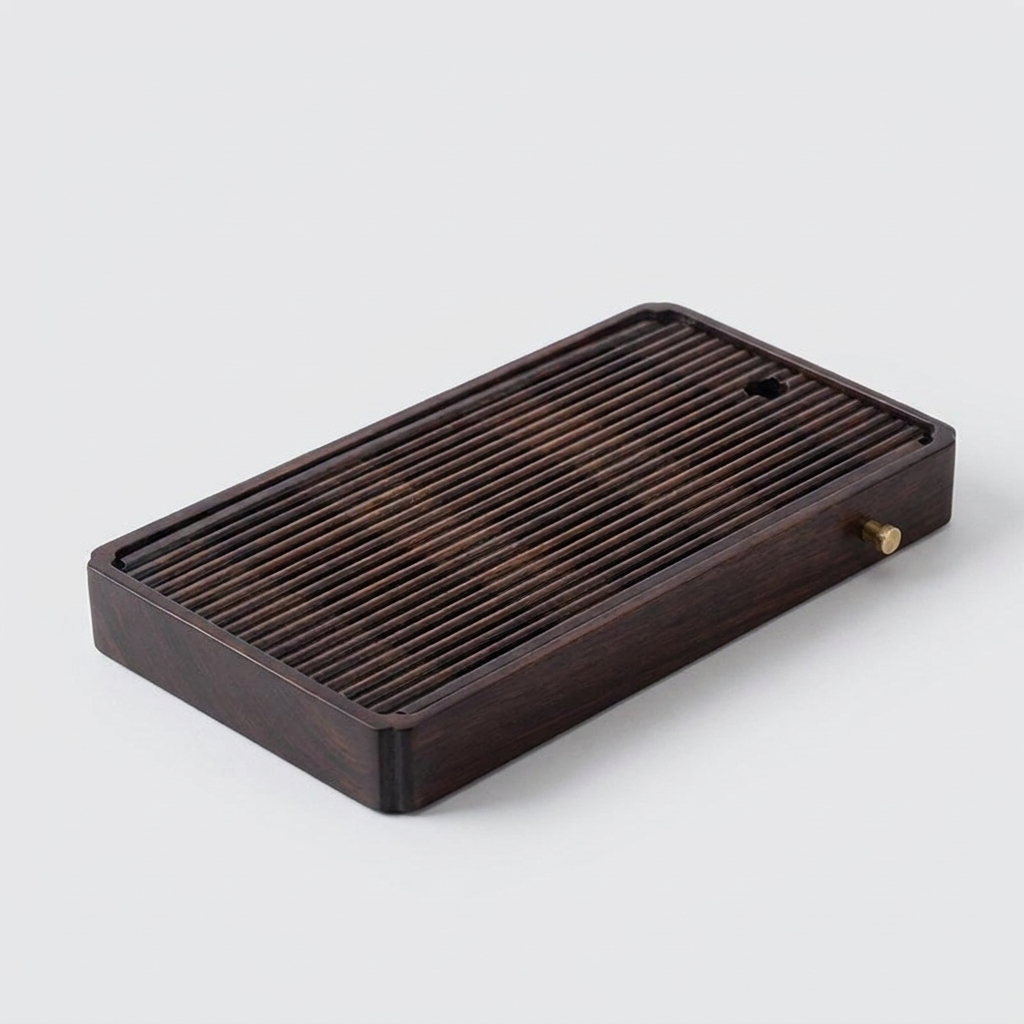 Bamboo tea tray with water drain on a plain background