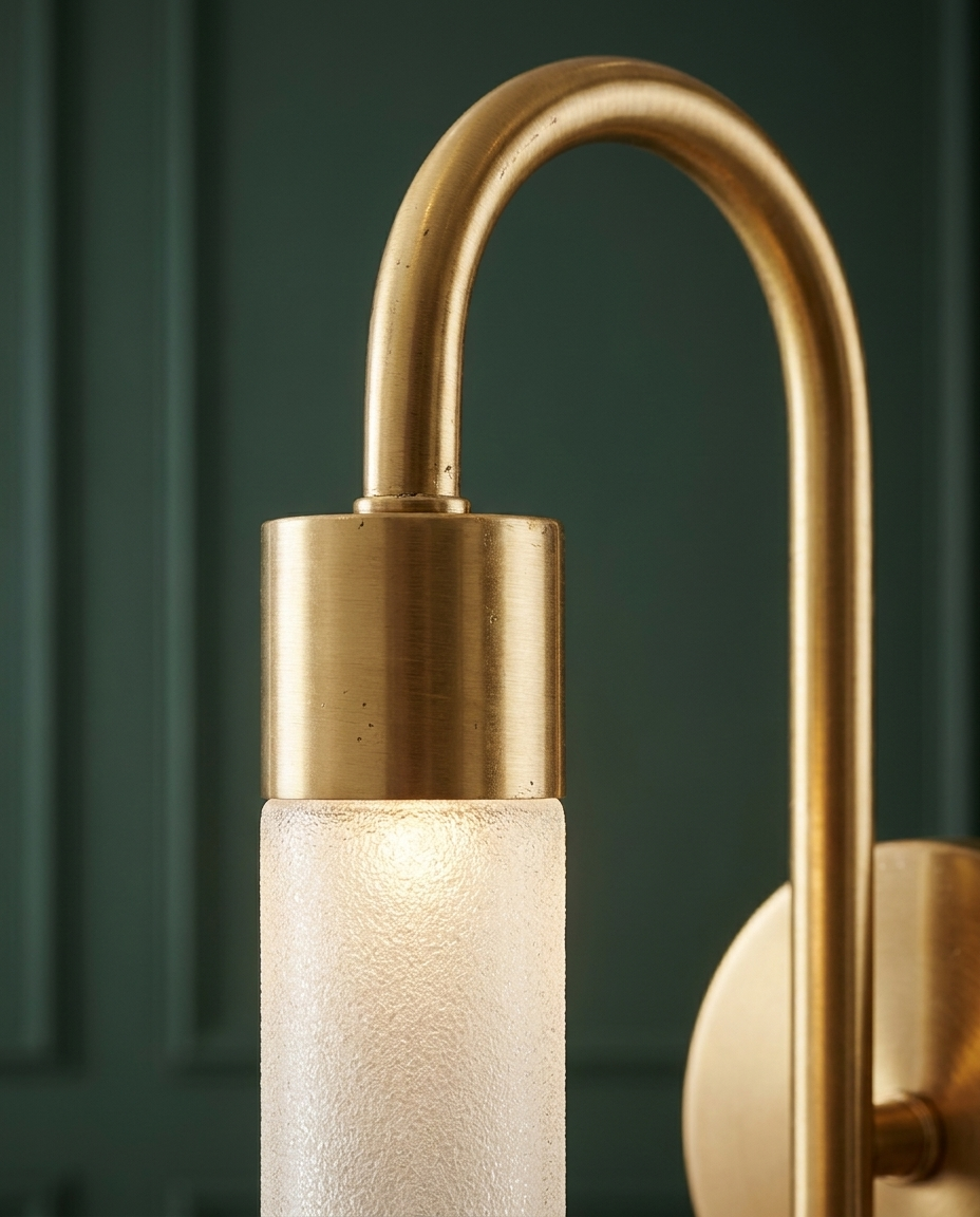 Close-up of gold finish and frosted glass cylinder texture