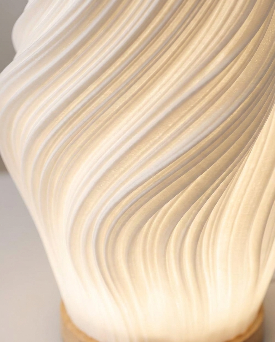 Close-up detail of the wave-shaped lamp surface texture and finish