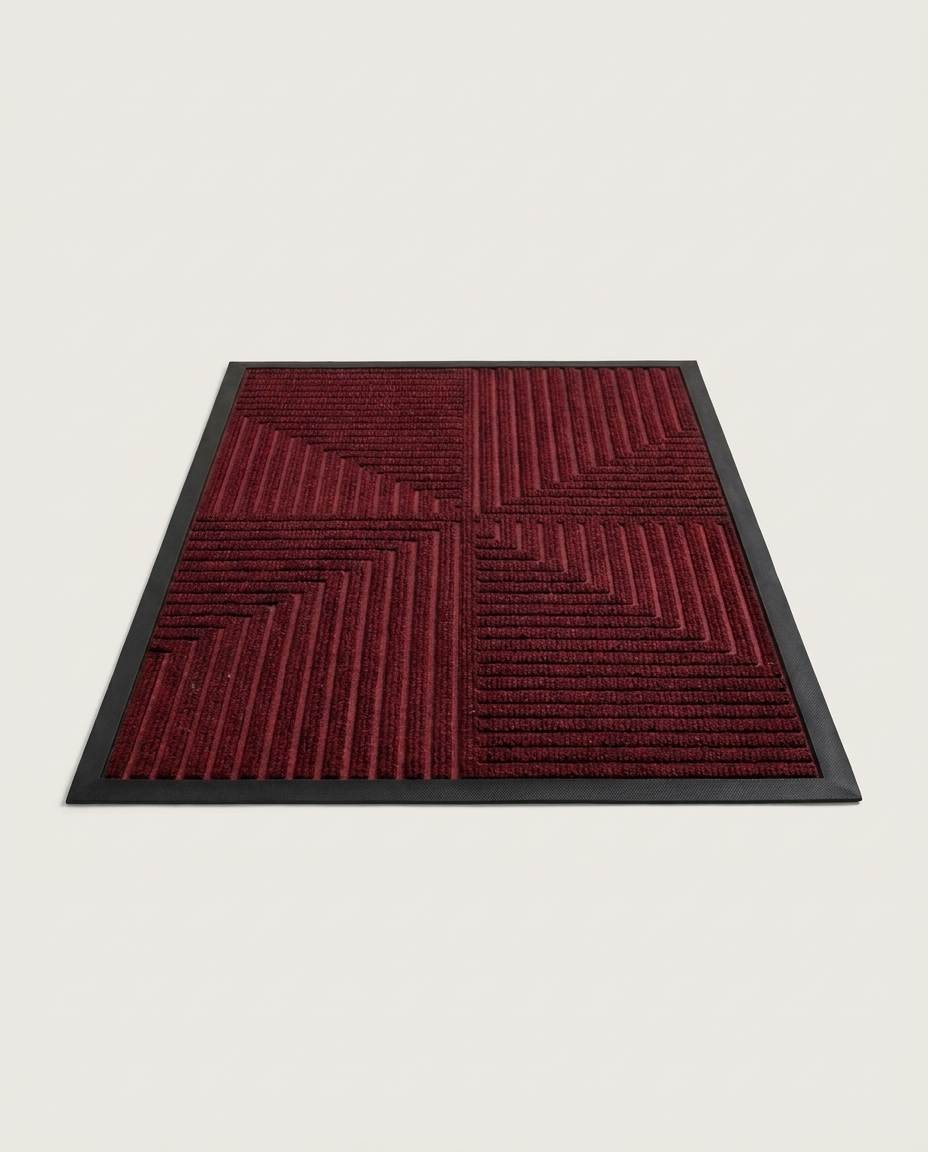 Anti-slip striped doormat isolated on a clean neutral studio background