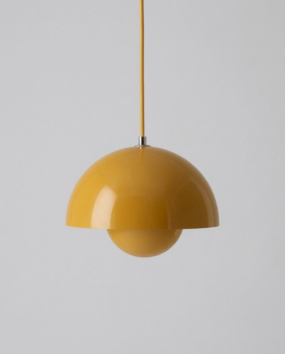 Modern flowerpot pendant light isolated on a clean neutral studio background